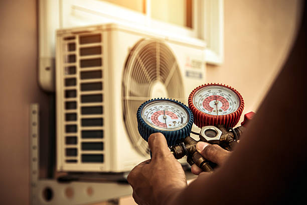 Professional Hvac technician working in Jemison, AL